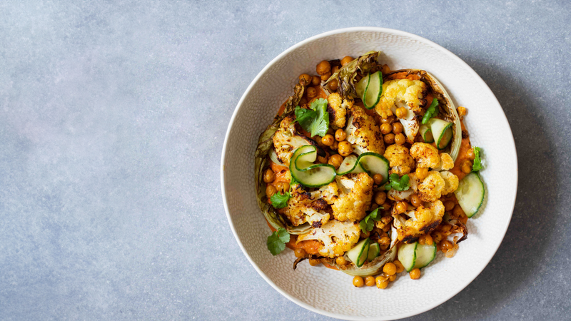 Roast cauliflower and chickpeas with pickled cucumber and red pepper sauce